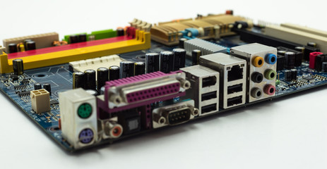Motherboard with visible PCI express connector slot, heat sink, memory slot, cpu socket in blue.