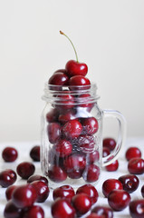 jar full of red cherries
