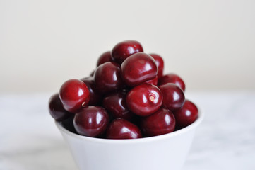 bowl with red cherries