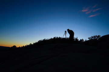 Landscape Photographer With Camera and Tripod, Silhouette During Sunrise