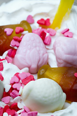 Decoration of a milkshake with confectionery. Cold sweet dessert.