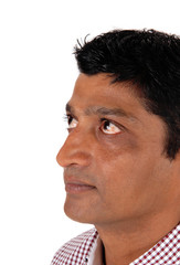 Close up image of the face of an Asien man