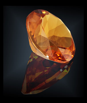 citrine gem stone isolated on black background