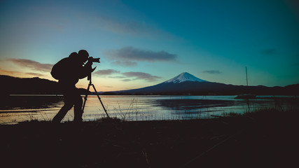 Silhouette Photographer With Fuji Mount