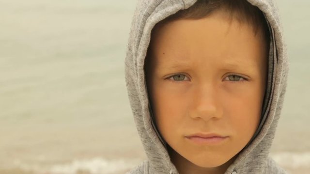 Portrait of a boy against the sea