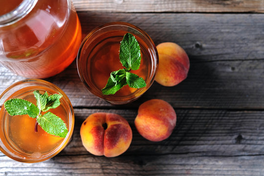 Fresh Homemade Peach Sweet Tea with Mint