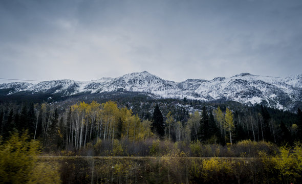 Look at snow covered Rocky Mountains in autumn