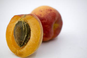Naklejka na ściany i meble Ripe apricot isolated on white background