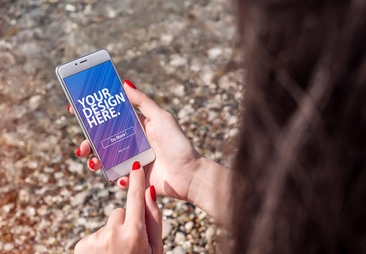 Hands Holding Smartphone in a Natural Landscape Mockup