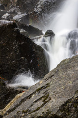 Boyana Waterfall long exposure stream flowing through the rocks, Vitosha Mountain, Sofia Bulgaria
