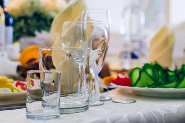 Beautifully decorated table in the cafe. Festive banquet.
