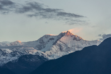 Kangchenjunga mountain at sunrise view from Pelling in Sikkim, India. Kangchenjunga is the third highest mountain in the world.