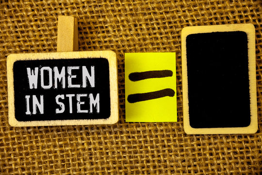 Text sign showing Women In Stem. Conceptual photos Science Technology Engineering Mathematics Scientist Research