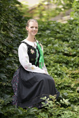 Young beautiful slovak woman in traditional costume