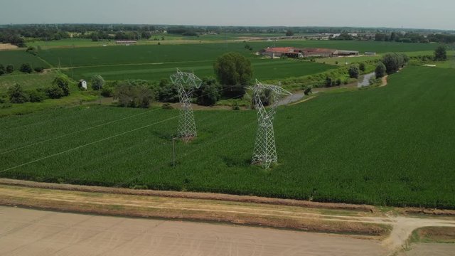 Power lines, steel trusses (approaching + tilt down)