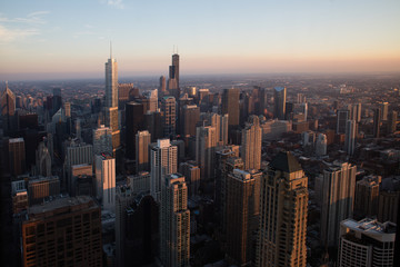 The Chicago City Skyline At Sunset From Above