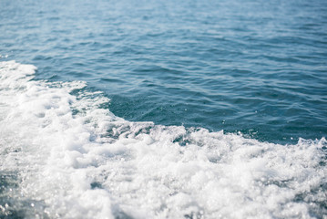 Blue water waves and water bubbles.