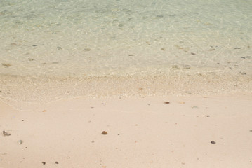 Clear water of the sea and sand beach.