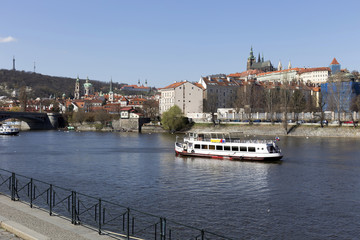 Spring Prague gothic Castle with the Lesser Town above River Vltava in the sunny Day, Czech Republic