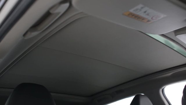 The Sunroof of the new modern Car Nissan close and opens automaticly