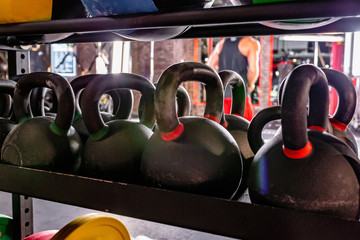 Naklejka na ściany i meble Fitness equipment gym, Exercise with many dumbbell on the shelf.