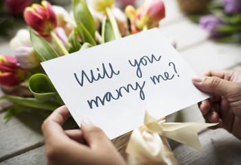 Flower bouquet with the phrase will you marry me
