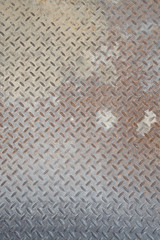 Grungy Industrial Checker Plate Background Texture with Rusty Worn Embossed Raised Diamond Pattern...