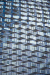 Modern steel and glass facade of an office building
