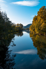 Still River Reflecting The Trees And Sky In Washington