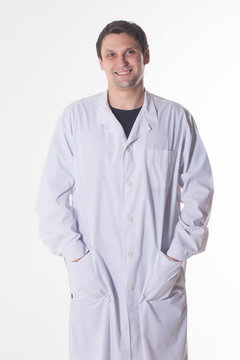 a man in a white robe. smiling doctor on white background