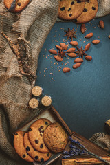 Tasty oatmeal cookies with raisins on  table. View from top.Beautifully decorated table.