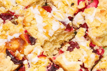 Fresh baked yeast cake with crumble and plum, delicious dessert