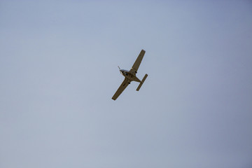 the plane hovers in the sky