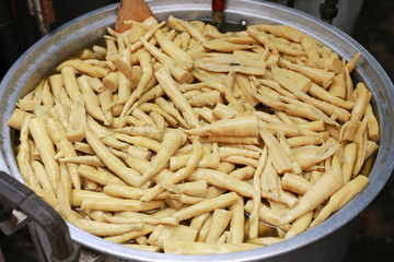 Boiled bamboo shoots in big pot.
