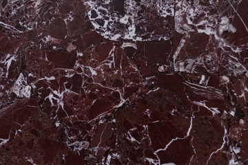The red marble. Texture.