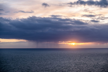 Naklejka na ściany i meble Dramatic clouds above the Atlantic between Wales and Ireland