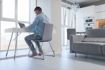 Young man with laptop