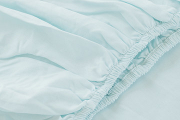 Texture of fabric is blue color background,Wavy folds of cloth