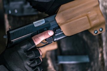 sports shooting instructor check your weapons close-up