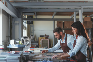 Young people in aprons