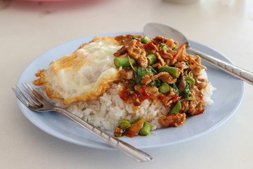 Kao-Pad-Kra-Prao, spicy food, chili food, or Thai rice with pork and basil, Thailand street food