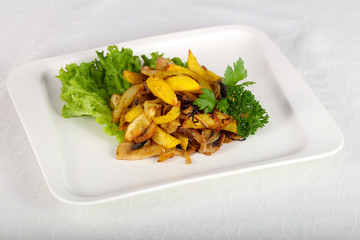Fried potato with mushrooms