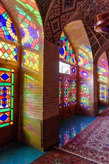 Fototapeta na wymiar Stained glass window of Nasir Ol-Molk mosque, also famous as Pink Mosque. Shiraz. Iran