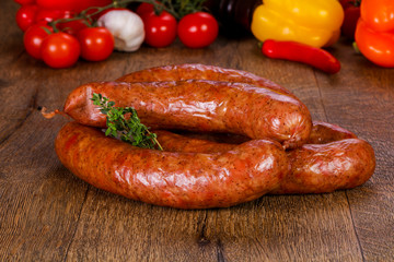 Pork sausages over wooden