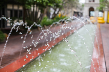 Fountain with high shutter speed to freeze water drops in air