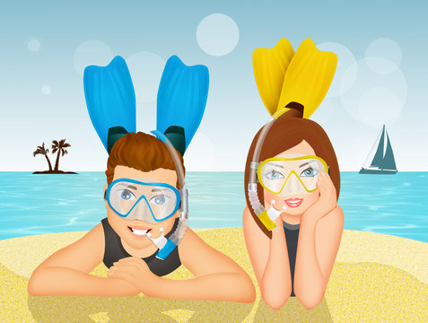 couple with scuba mask and fins
