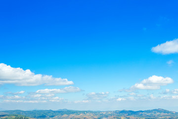 Obraz premium blue sky background texture with white clouds.