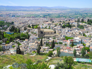 Fototapeta na wymiar Albaicin, Old muslim quarter, district of Granada in Spain. View from the top of Sacromonte mountain. Panorama.