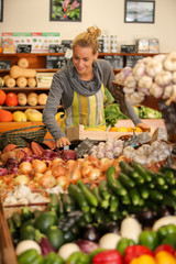 vegetables seller in retail store