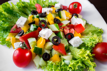 European international fusion cuisine, a beautiful dish on a white plate decorated with herbs and vegetables. a professional chef has prepared a delicious meal.